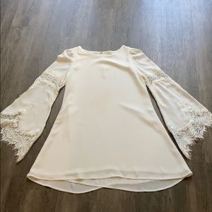 White long sleeve dress with lace detail
